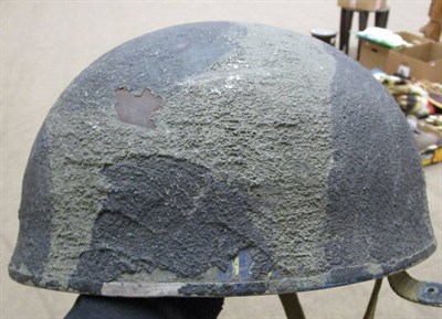 Lot 184 - A Second World War British D-Day Mk.2 Paratrooper's Helmet by BMB, with camouflage paint, the...
