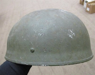 Lot 185 - A Second World War British Mk.2 Paratrooper's Helmet, with olive green paint, the webbing chin...