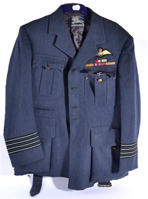 Lot 187 - A Second World War RAF Jacket to a Group Captain, with Pilot's wings and ribbon bars for...