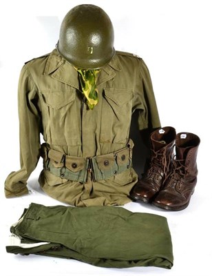Lot 190 - A Second World War US Airborne Uniform, comprising an M43 pattern tunic with embroidered sleeve...