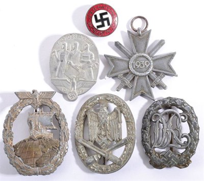 Lot 218 - German Third Reich Badges: comprising a General Assault badge; an Auxiliary Cruiser badge; a...