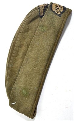 Lot 223 - A German Third Reich SS EM/NCO's  M40 Overseas Cap, in green wool mix, with fold down sides,...