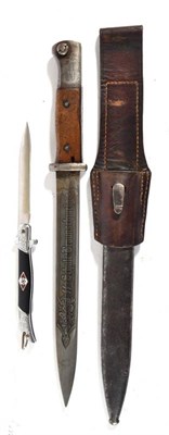 Lot 239 - A German Third Reich K98 Bayonet, one side of the blade later etched SS - Schule Braunschweig,...