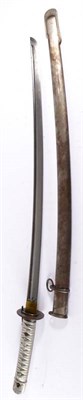 Lot 243 - A Japanese Second World War NCO Shin Gunto Katana, the 67cm single edge steel blade with a...