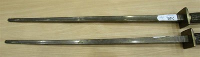Lot 246 - A Pair of Early 19th Century Chinese Bronze Sword Breakers, each with 55.5cm heavy square...