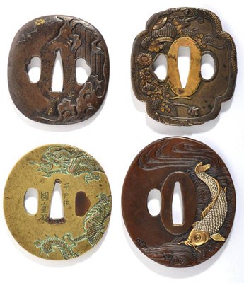 Lot 249 - A Japanese Bronze Tsuba, of oval form, each side cast with a carp with shakudo type decoration...