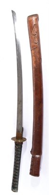 Lot 252 - A Japanese Gendaito O-Wakizashi, the 59.5cm blade with undulating hamon, with signature to each...