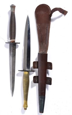 Lot 276 - A Second Pattern Fighting Knife, with hand forged blade, the blued crossguard double struck...