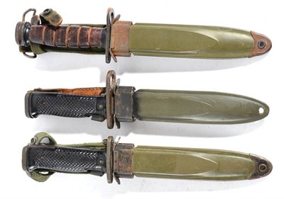 Lot 284 - Three U.S. Bayonets, comprising M3, unmarked, ribbed leather grip, the scabbard stamped, ''U.S....