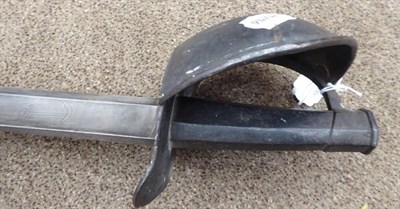 Lot 286 - A French Model 1833 Naval Cutlass, the 68 cm, broad, fullered, single edge blade engraved with...