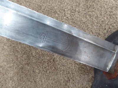Lot 286 - A French Model 1833 Naval Cutlass, the 68 cm, broad, fullered, single edge blade engraved with...