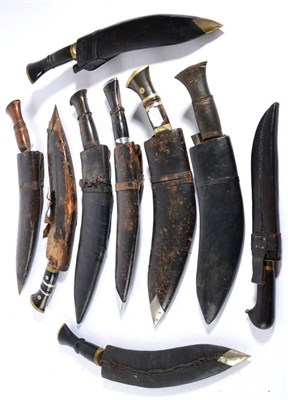 Lot 336 - An Indian Kukri, the 32cm blade with two broad shallow fullers and a narrow fuller to the back...