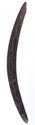 Lot 357 - A 19th Century Aboriginal War Boomerang, incised to one side with a sinuous snake-like design...