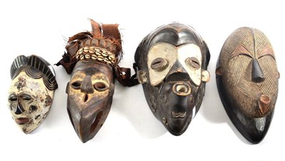 Lot 361 - An African Gaigon Mask, of ebonised wood, with incised and chequered coiffure, domed forehead,...