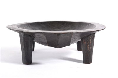 Lot 375 - A Fijian Small Kava Bowl, of dark stained hardwood, the dished circular top on four tapering...