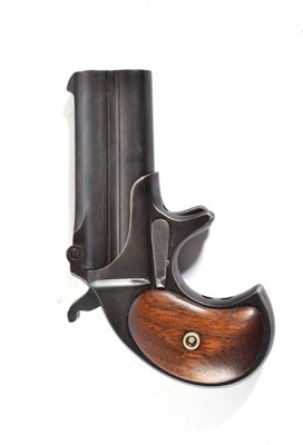 Lot 453 - A Remington Double Deringer Model 4, with blued finish, the 7.5cm over and under barrels...