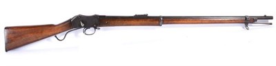 Lot 517 - A Victorian Martini-Henry .450 Service Rifle, the 85cm round blued barrel with hinged ladder...