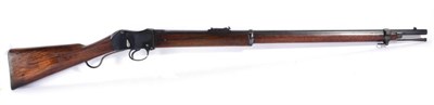 Lot 518 - A Victorian Martini-Henry .450 Service Rifle, the 85cm round blued barrel with hinged ladder...