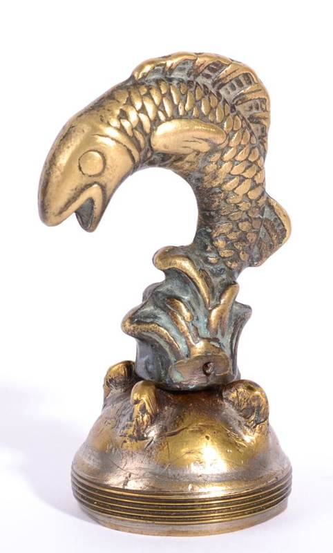Lot 1003 - A Ford Model T Brass Accessory Mascot, in the form of a sea monster, mounted on a Ford Model T...