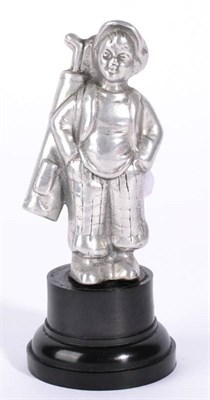 Lot 1005 - A Vintage Polished Aluminium Sporting Accessory Mascot, modelled as a caddy boy, circa 1920/30s, on