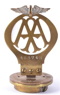 Lot 1024 - An Early 20th Century Brass AA Badge, numbered 48374H, mounted on a brass radiator cap Adamsez...
