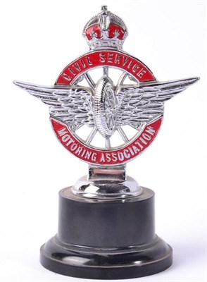 Lot 1026 - A Chrome and Enamel Civil Service Motoring Association Badge, mounted on a later black plastic...