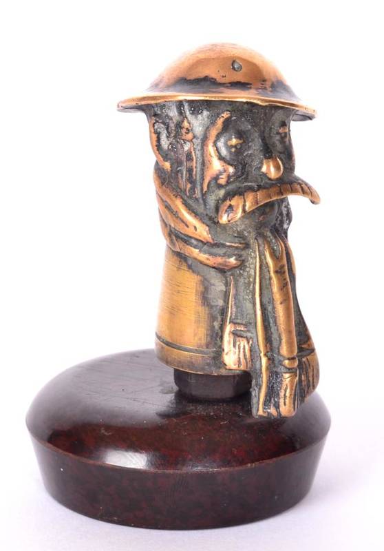 Lot 1039 - An Early 20th Century Bronze Cast Car Mascot, in the form of Old Bill, his helmet signed Bruce...