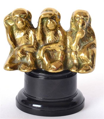 Lot 1040 - A Brass Three Wise Monkeys Accessory Mascot, circa 1910, as sold by Brown Brothers Motor...