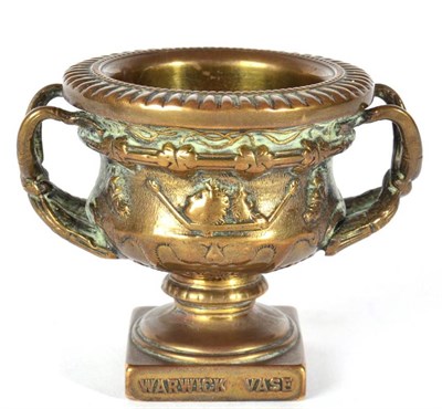 Lot 1047 - A 1920s Brass Car Mascot, in the form of a Warwick Vase from Warwick Castle, the base stamped...