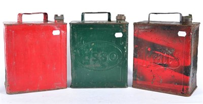 Lot 1097 - Three Vintage Fuel Cans, comprising a green painted Esso example, a red painted Pratts example...