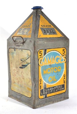 Lot 1104 - A 1920s Gamages 5 Gallon Motor Oil Can, Grade XXL, with metal carrying handles and screw top,...