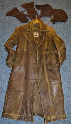Lot 1114 - A Vintage Brown Leather Motor Cycle Jacket, labelled The Majestic Leather Coat, heavily worn...
