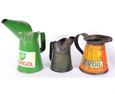 Lot 1133 - Three Oil Cans, to include: a Shell Motor Oil quart size jug, decorated on both sides Shell...