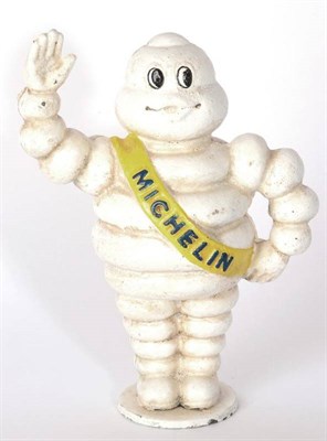 Lot 1136 - A Michelin Cast Metal Advertising Figure, modelled as the Michelin Man, painted white with a yellow
