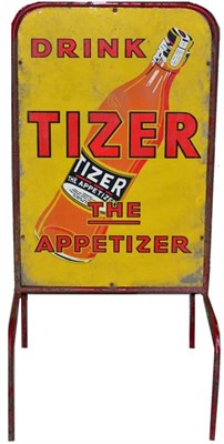 Lot 1169 - A Double Sided Free-Standing Metal Advertising Sign, Drink Tizer The Apertizer, with red...