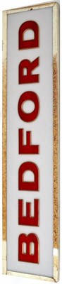 Lot 1171 - A 1950/60s Bedford Metal Cased Illuminated Sign, with perspex panel and red and gilded...