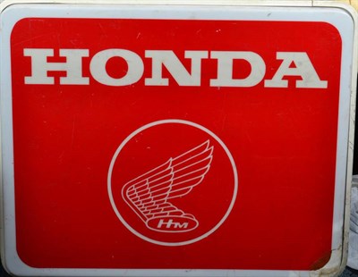 Lot 1184 - A HONDA Illuminated Perspex Advertising Sign, decorated with a winged emblem and the letters HM, in