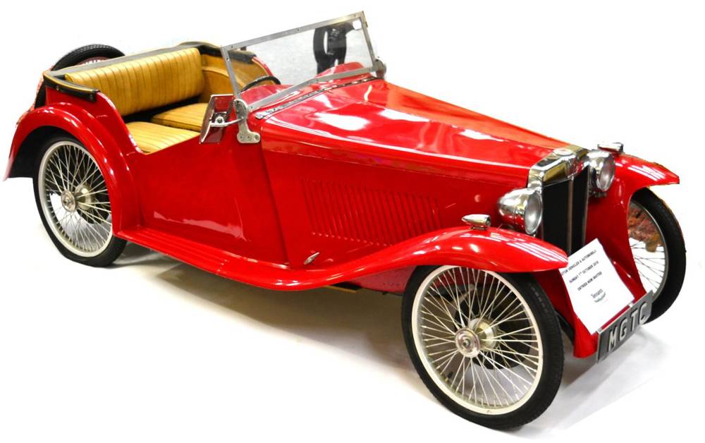 Lot 1229 - Timeless Toys: A Good 1940s Battery Operated Pedal Car, modelled as an MGTC in red, with key...