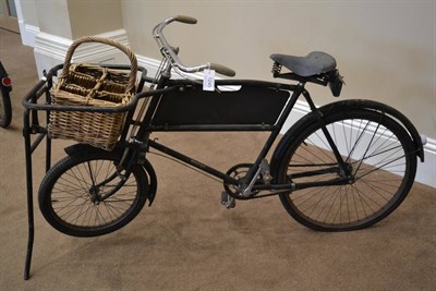 Lot 1245 - A Vintage 1950s Raleigh Delivery Bike, with repainted black frame and Dunlop sprung seat, with...