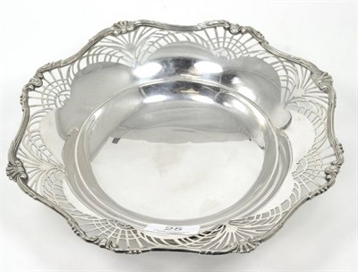 Lot 25 - A silver pedestal dish, Adie Bros, Birmingham 1935, with fan pierced shaped rim, 26cm diameter,...
