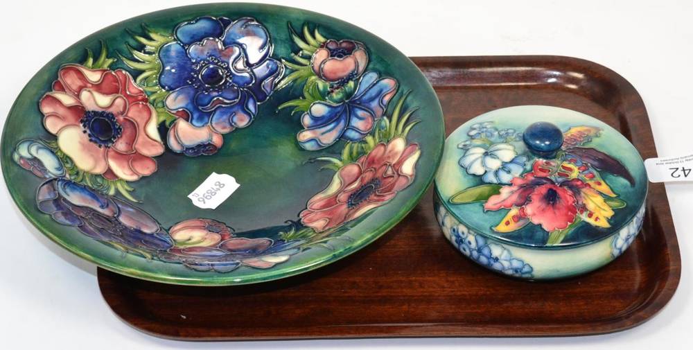 Lot 42 - A Moorcroft bowl in the anemone pattern together with a Moorcroft bowl and cover