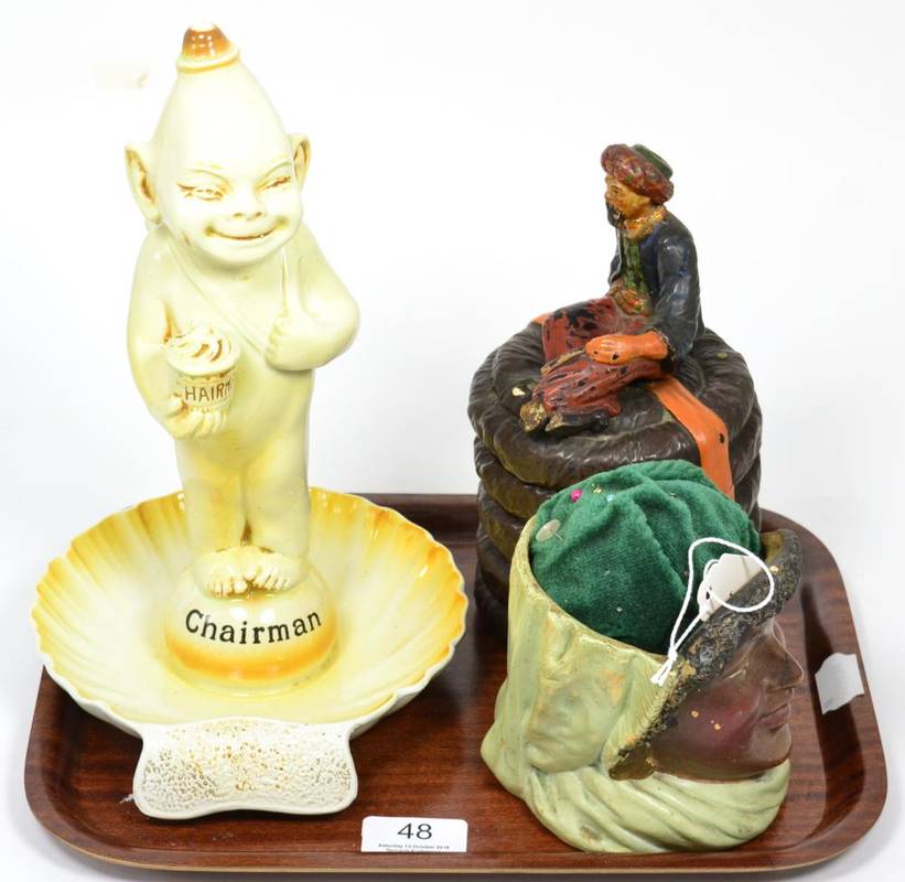 Lot 48 - A Wilkinson novelty ashtray, 'The Chairman'; a tobacco jar and cover modelled as an Arab sitting on