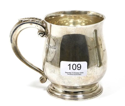 Lot 109 - A silver pint baluster mug, Goldsmiths & Silversmiths, London 1938
