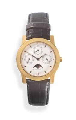 Lot 123 - An 18ct Gold Automatic Triple Calendar Moonphase Wristwatch, signed Bucherer, circa 2000, lever...