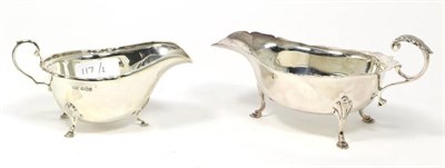 Lot 117 - A silver sauce boat, Joseph Rodgers, Sheffield 1900, of George III style; together with a...