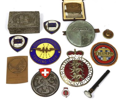 Lot 125 - A group of early 20th century enamelled car badges and racing medals including some for...