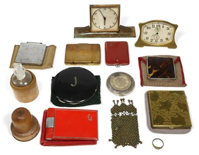 Lot 128 - A group of 1930s and later compacts together with two Art Deco lady's dressing table timepieces