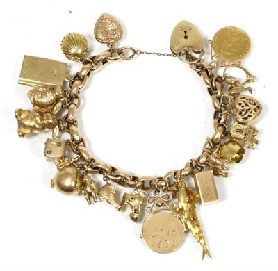Lot 133 - A charm bracelet, suspending various 9 carat gold and other charms and a soldered Victorian...