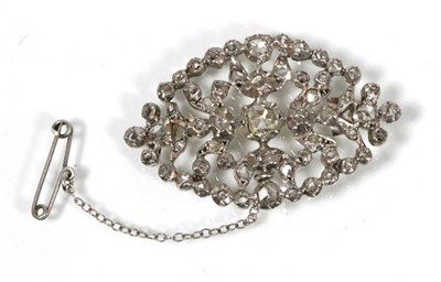 Lot 136 - A rose cut diamond brooch, collet set within a pierced oval frame, measures 3cm by 4.5cm