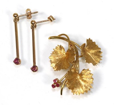 Lot 147 - An 18 carat gold ruby spray brooch, measures 3.5cm by 3cm and a pair of 9 carat gold ruby...